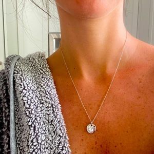 Tiffany “K” initial necklace.  Worn less than 5 times, just shined by Jeweler.